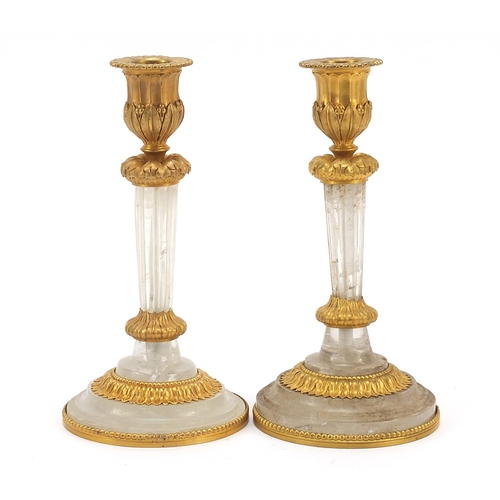 41 - Pair of French Empire design ormolu and rock crystal candlesticks, each 19.5cm high