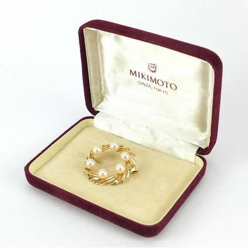 34 - 9ct gold Mikimoto pearl brooch with box, 3.5cm in diameter, 7.9g