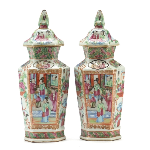 58 - Good pair of Chinese Canton porcelain hexagonal vases and covers with figural knops, each hand paint... 