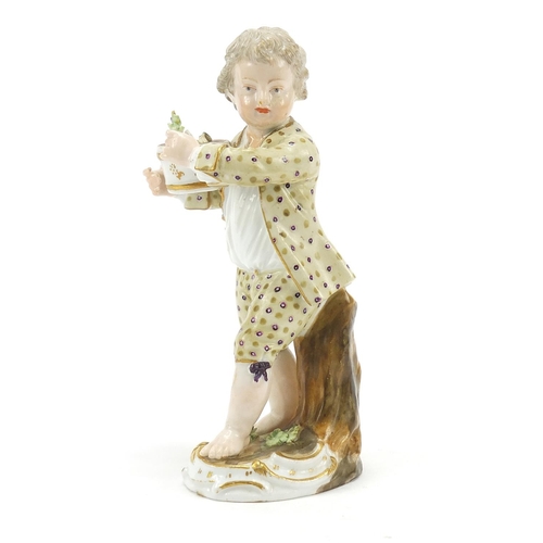 20 - 18th century Continental porcelain figure of a young boy possibly by Meissen, 12.5cm high