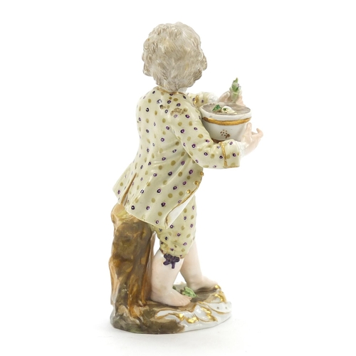 20 - 18th century Continental porcelain figure of a young boy possibly by Meissen, 12.5cm high