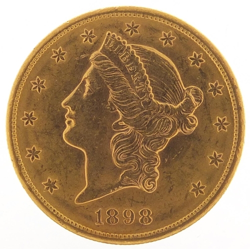 525 - United States of America 1898 gold twenty dollars, Liberty head to the reverse, 33.6g - this lot is ... 