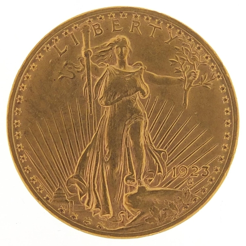 585 - United States of America 1923 gold twenty dollars, 33.5g - this lot is sold without buyer’s premium,... 