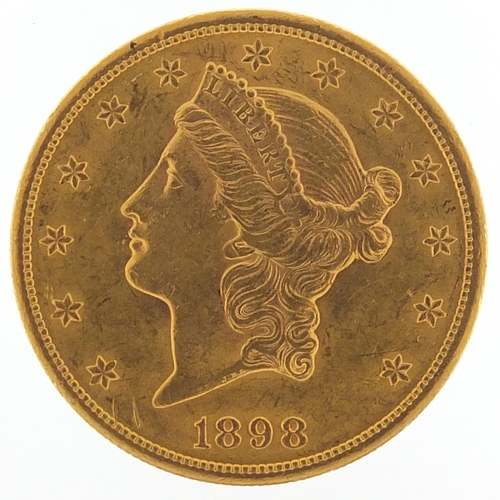 550 - United States of America 1898 gold twenty dollars, Liberty head to the reverse, 33.6g - this lot is ... 