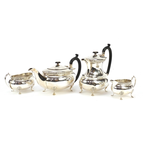 2299 - Celtic design silver plated four piece tea service with ebonised handles, the largest 21cm high