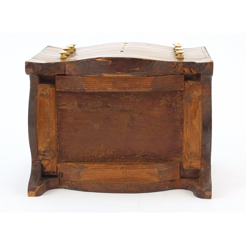 23 - Victorian inlaid mahogany tea caddy in the form of a serpentine fronted six drawer chest, 17cm H x 1... 
