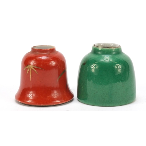 239 - Two Chinese porcelain water pots having red and green glazes, the largest 5.5cm high