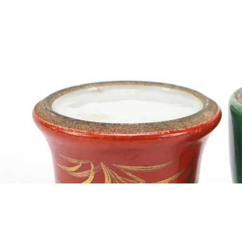 239 - Two Chinese porcelain water pots having red and green glazes, the largest 5.5cm high