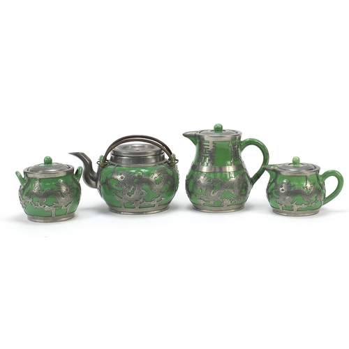 240 - Chinese pewter mounted pottery four piece tea set comprising two jugs, sugar bowl and teapot, the pe... 