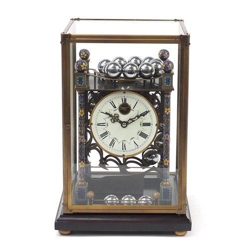 6 - Champlevé enamel rolling ball clock with enamel dial having Roman numerals and glass display case, o... 