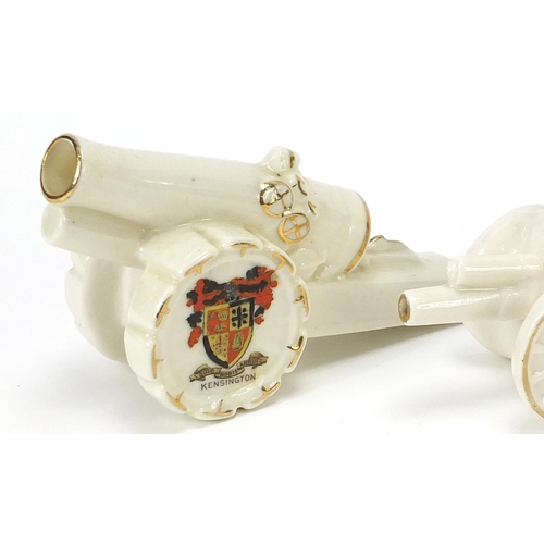 1508 - Four military interest crested china guns including model of field gun and model of new field gun, t... 