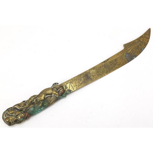 70 - Japanese mixed metal bronzed letter opener and a vesta case embossed with birds amongst trees, the l... 