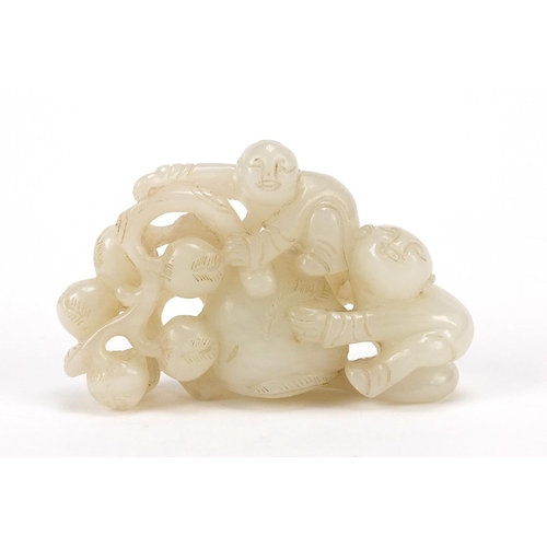 76 - Chinese white jade carving of two boys and peaches, 8cm wide