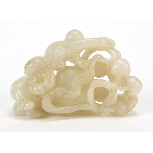 76 - Chinese white jade carving of two boys and peaches, 8cm wide