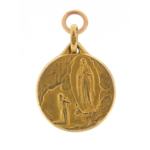 218 - Continental gold coloured metal Madonna pendant, 2cm high, 2.7g