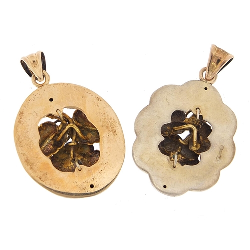 219 - Two Continental 800 grade silver gilt flower pendants, 4cm high, 10.8g