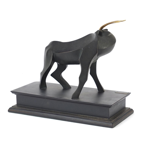 109 - Modernist patinated bronze study of a stylised gazelle raised on a rectangular block base with plaqu... 