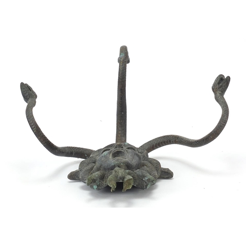 13 - Early 20th century patinated bronze wall mask of  Medusa with three serpent hangers, 31cm high