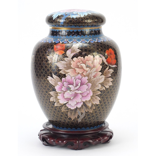 65 - Large Chinese cloisonné ginger jar and cover enamelled with flowers, raised on a carved hardwood sta... 