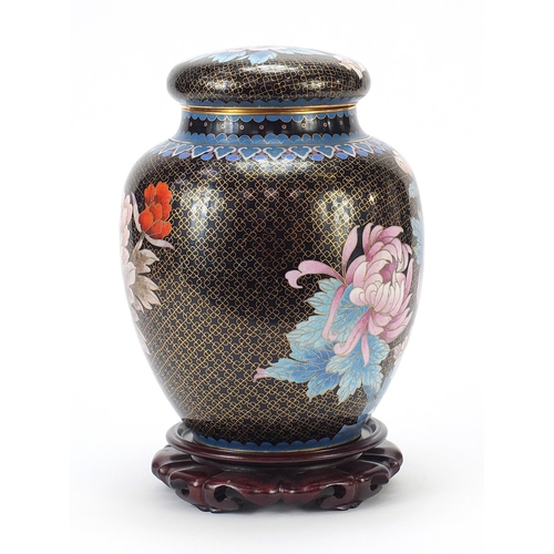 65 - Large Chinese cloisonné ginger jar and cover enamelled with flowers, raised on a carved hardwood sta... 