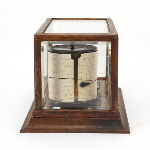 8 - Victorian eight ring barograph with charts housed in a glazed oak case, 18cm H x 35cm W x 20cm D