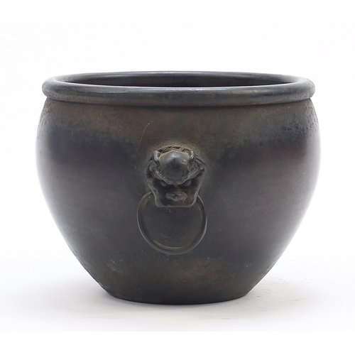 242 - Chinese patinated bronze censer with animalia ring turned handles, character marks to the base, 13.5... 