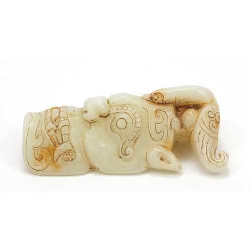 246 - Chinese russet jade carving of a face mask, 18cm high