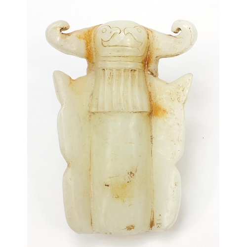 246 - Chinese russet jade carving of a face mask, 18cm high