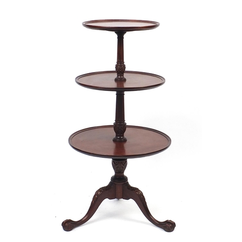 1634 - Mahogany three tier dumb waiter with ball and claw feet, 110cm high, the largest tier 55cm in diamet... 