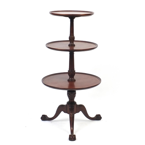 1634 - Mahogany three tier dumb waiter with ball and claw feet, 110cm high, the largest tier 55cm in diamet... 