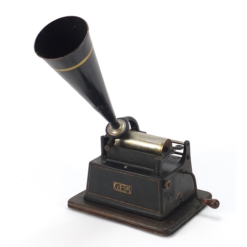 26 - Thomas Edison oak cased phonograph with horn and three reels, 25cm wide excluding the handle