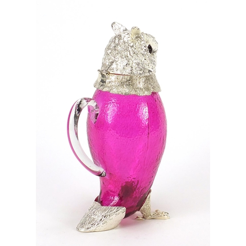 689 - Novelty cranberry glass owl jug with silver plated mounts and beaded glass eyes, 29cm high