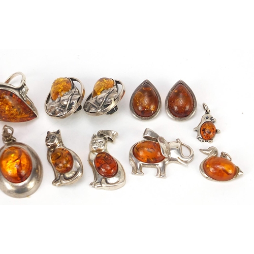 178 - Silver and amber jewellery including bracelet, earrings and animal pendants, 69.5g