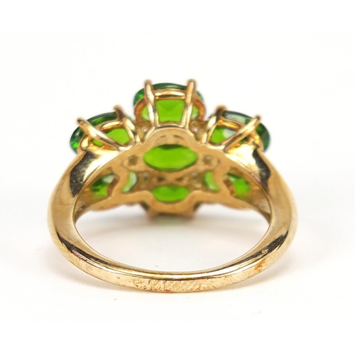 220 - 9ct gold green stone cluster ring, size K, 3.5g