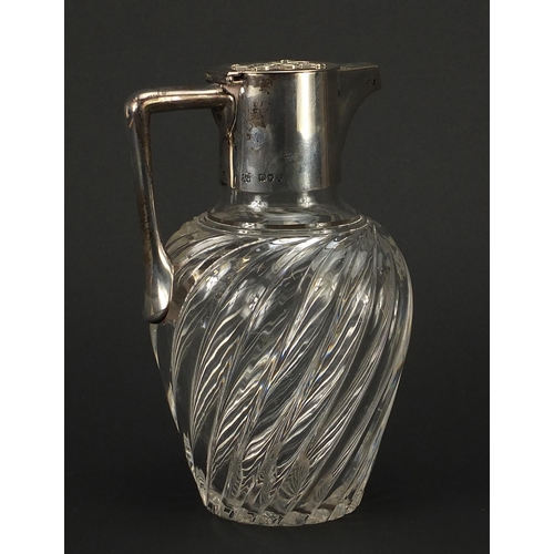 685 - Hukin & Heath, Victorian silver mounted glass jug with writhen body, London 1892, 20cm high