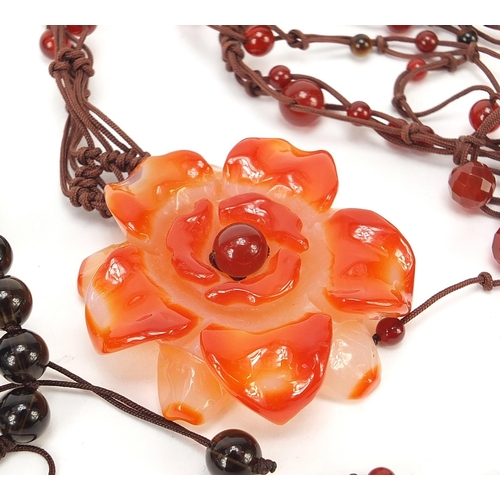 281 - Four Chinese hardstone pendant bead necklaces, the largest 60cm in length, total 206.0g