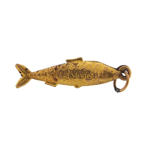 227 - 9ct gold fish charm, 2.2cm in length, 0.6g