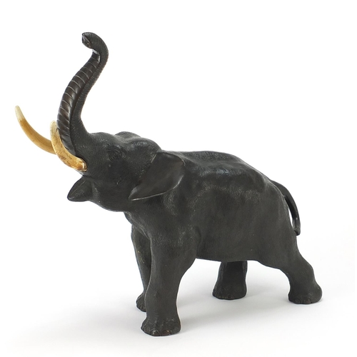 68 - Large Japanese Meiji period patinated bronze elephant with ivory tusks, three figure character marks... 