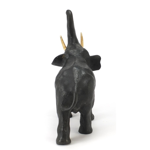 68 - Large Japanese Meiji period patinated bronze elephant with ivory tusks, three figure character marks... 