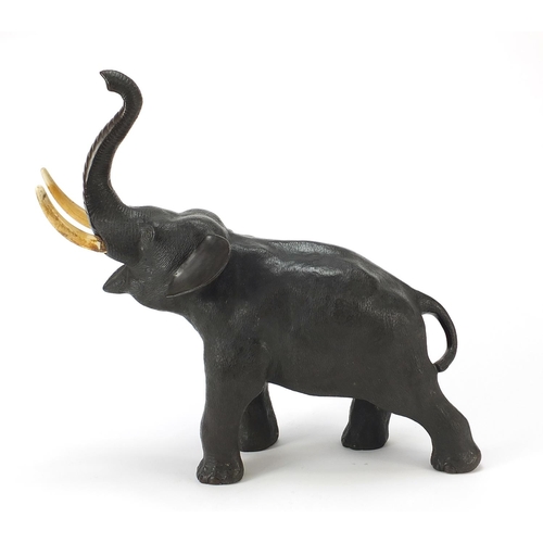 68 - Large Japanese Meiji period patinated bronze elephant with ivory tusks, three figure character marks... 