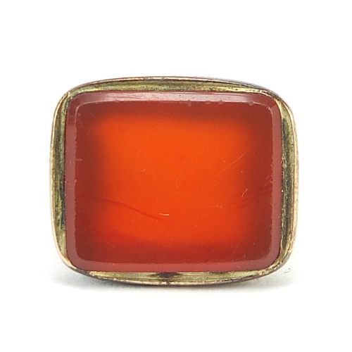 282 - Antique gold coloured metal carnelian fob, 2.1cm high, 4.4g