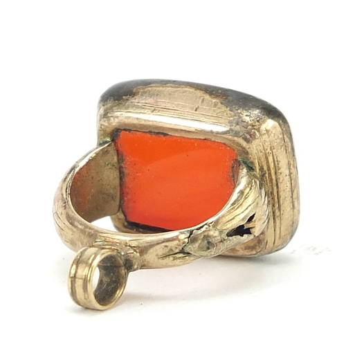 282 - Antique gold coloured metal carnelian fob, 2.1cm high, 4.4g