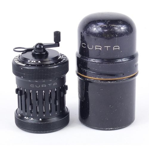 10 - Vintage Curta calculator with instructions, serial number 510375