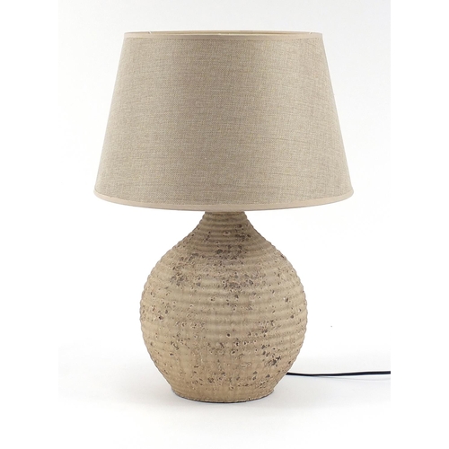 2297 - Contemporary stone effect ceramic table lamp with shade, retailed by Grand Illusions, 57cm high