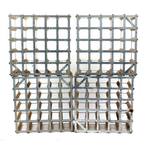 2296 - Four wooden and metal bottle racks, each 52cm x 52cm