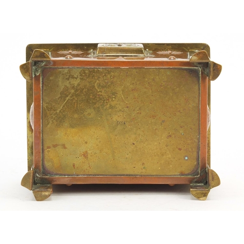 3 - Arts & Crafts enamel, copper and brass casket with embossed floral motifs raised on four stylised fe... 
