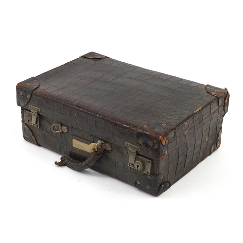 2283 - Early 20th century taxidermy interest crocodile skin suitcase, 34.5cm H x 51cm W x 17cm D