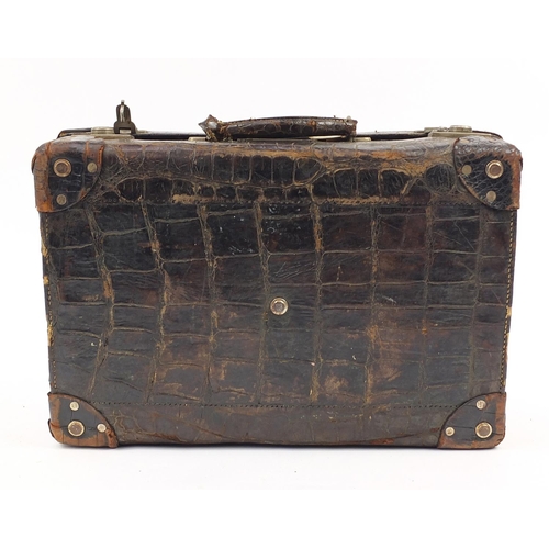 2283 - Early 20th century taxidermy interest crocodile skin suitcase, 34.5cm H x 51cm W x 17cm D