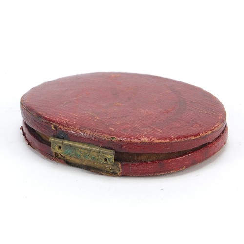 31 - Georgian oval hand painted portrait miniature of a gentleman housed in a red leather case with silk ... 