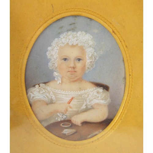 32 - 19th century oval hand painted portrait miniature of a young girl holding a rattle, housed in a leat... 